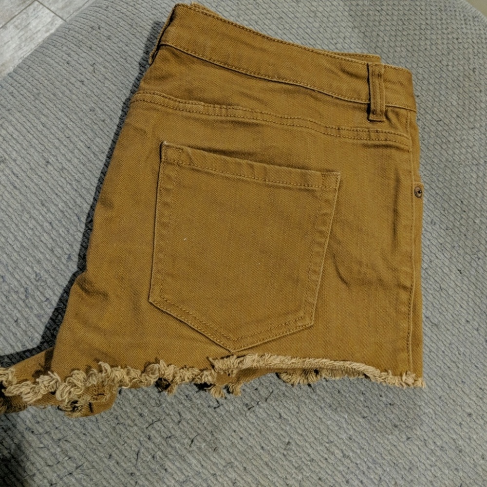 Brown fringed shorts